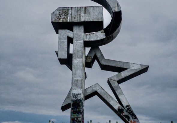 sculpture representing a communist sickle a hammer and a star