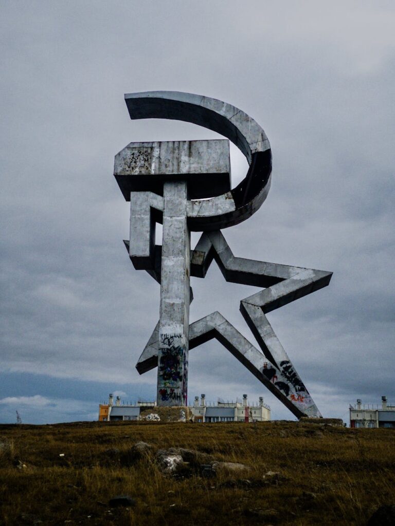 sculpture representing a communist sickle a hammer and a star